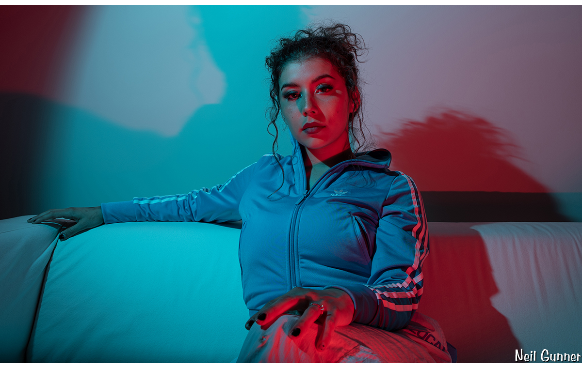 Sharlene with red and blue light