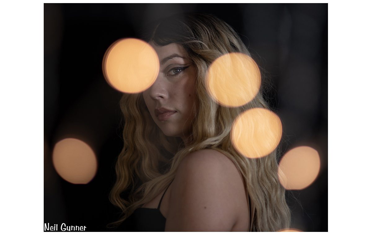 Sharlene with string lights