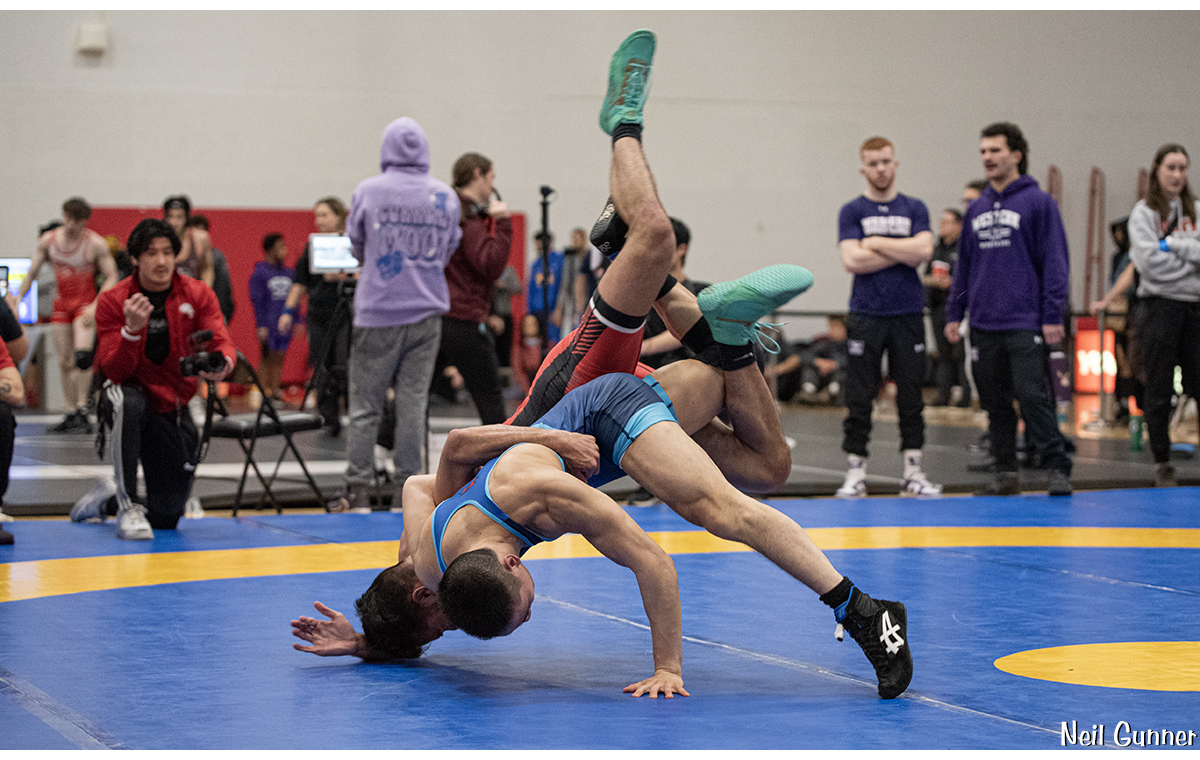 Wrestlers tussle on the mat