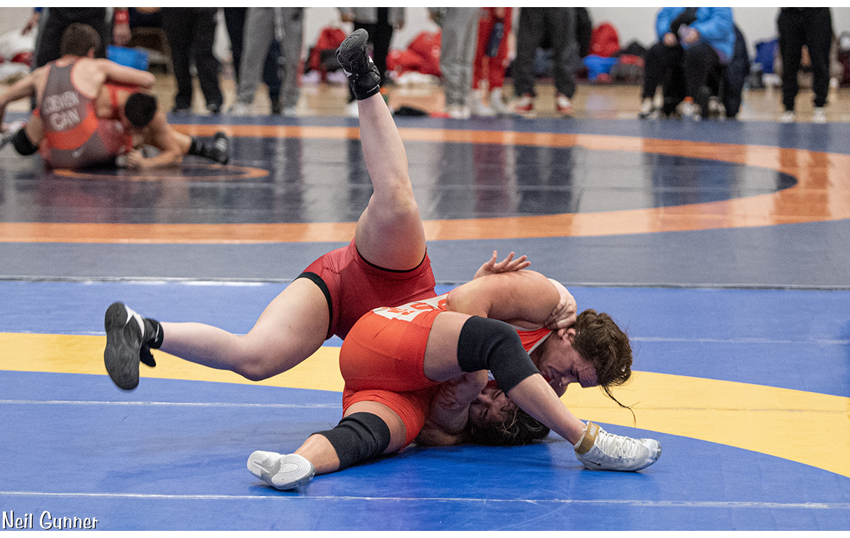 Wrestlers tumble on the mat